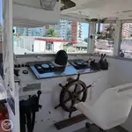 Ambarcațiune de debarcare, cu rezervoare de vânzare