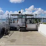 Ambarcațiune de debarcare, cu rezervoare de vânzare