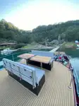 Ambarcațiune de debarcare, cu rezervoare de vânzare